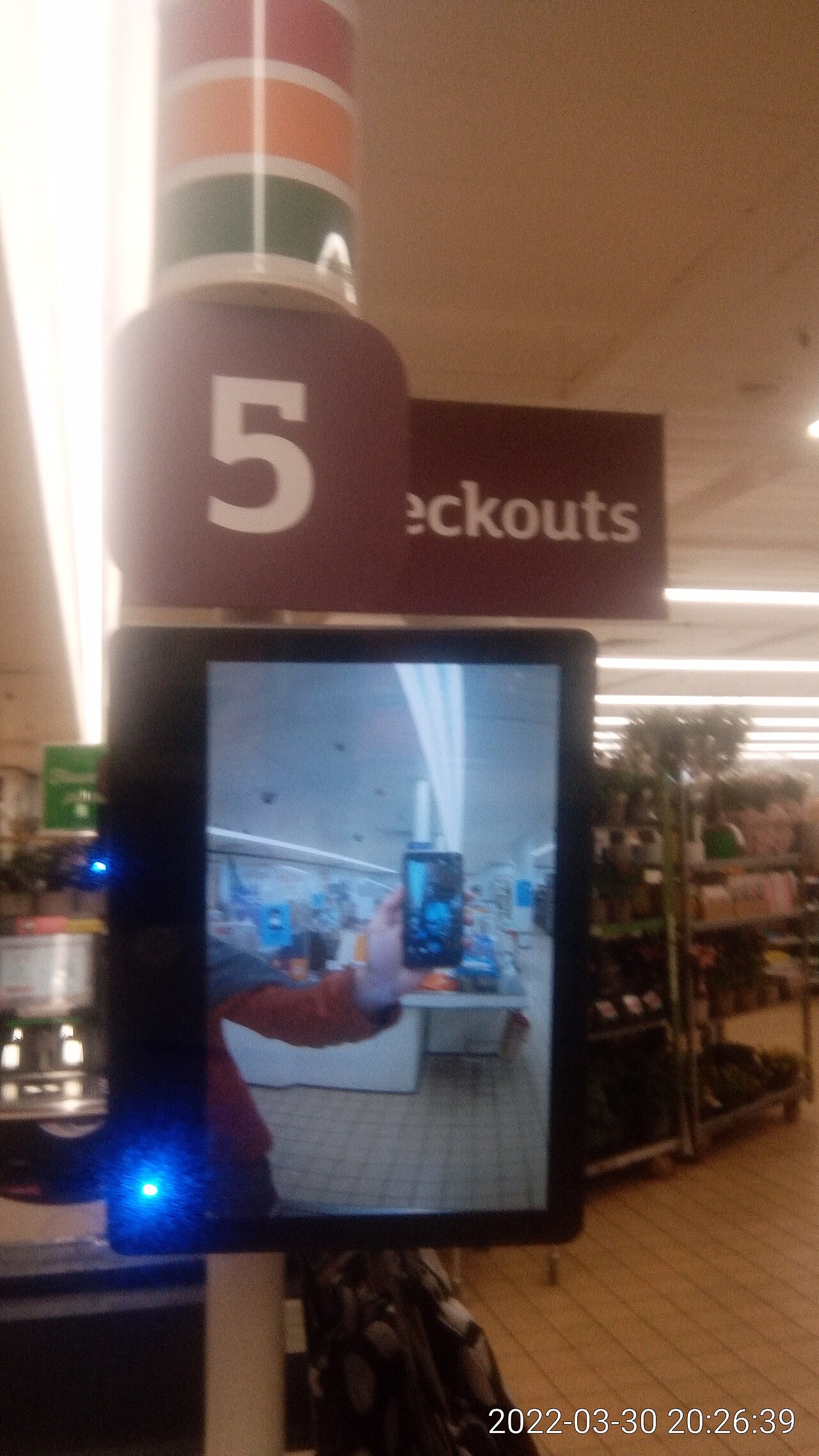 Camera and video screen at Sainsbury's s