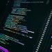 Close-up of colorful programming code on a computer screen, showcasing digital technology.