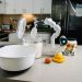 AI-powered robot assisting in a kitchen, highlighting smart technology in everyday cooking.