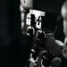 Detailed close-up of a robot's mechanical components, emphasized by moody studio lighting.
