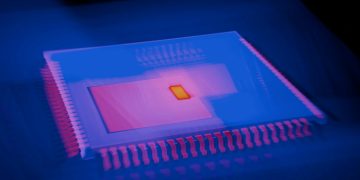 Blurred abstract image of a microchip with heatmap colors highlighting technological innovation.