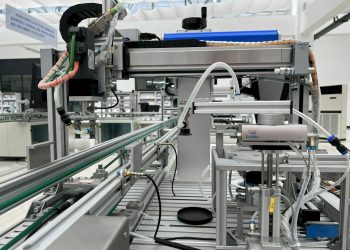 Close-up view of modern automation machinery in an industrial setting.