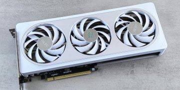 Stylish white graphics card with three cooling fans on a neutral background, ideal for tech enthusiasts.