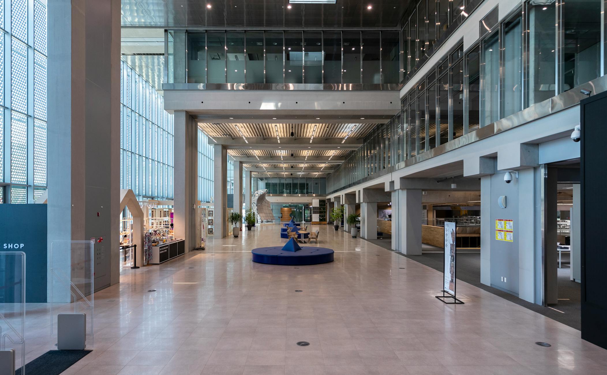 Explore the sleek and modern architecture of a 광주 indoor public space.