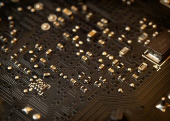 Detailed view of a circuit board showing various electronic components and traces.