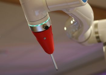 Detailed view of a cutting-edge industrial robotic arm in action.