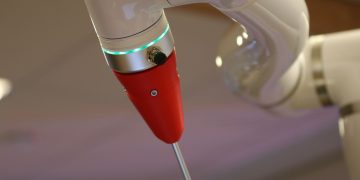 Detailed view of a cutting-edge industrial robotic arm in action.