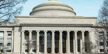 The grand neoclassical architecture of MIT building showcasing its historic significance.