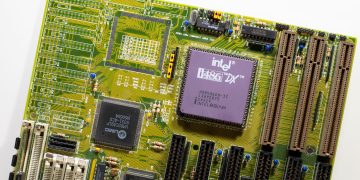 Close-up view of a vintage Intel i486 DX motherboard, highlighting retro technology.