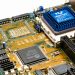 Detailed view of an Intel i486 DX2 CPU installed on a vintage motherboard with chips and circuits.