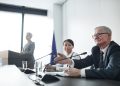 Panelists at an EU conference discussing law and diplomacy.