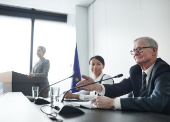 Panelists at an EU conference discussing law and diplomacy.