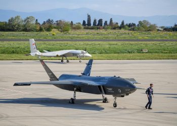Advanced military drones on a tarmac in Istanbul, Turkey, showcasing modern aerial technology.