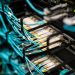 Numerous wires and cables mounted into server patch panel in modern data center