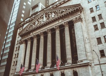 Historic New York Stock Exchange building facade captured in a vintage style.