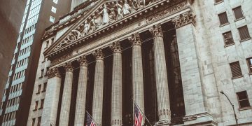 Historic New York Stock Exchange building facade captured in a vintage style.