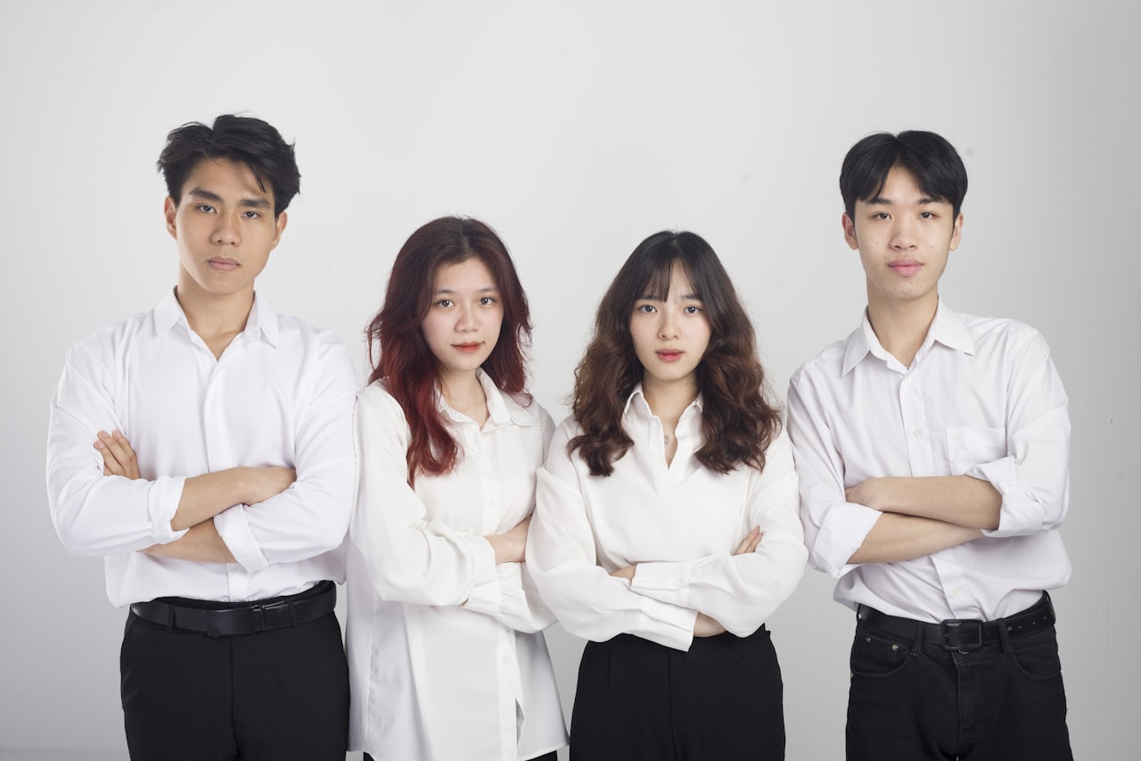 a group of people standing next to each other