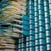 From below of fiber optic equipment with similar colorful rubber cables and round sockets