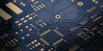 close up of dark blue circuit board