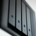Detailed view of a black data storage unit highlighting modern technology and data management.