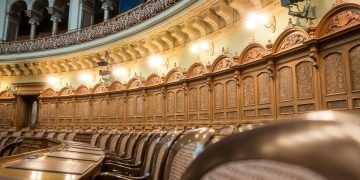 Interior view of the elegant Swiss Parliament council chamber in Bern, Switzerland.