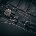 Detailed macro shot of electronic circuit board showing microchips and components.