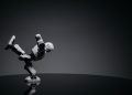 Minimalist photo of a toy robot balancing creatively in a studio setting.