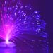 Abstract image of a vibrant purple and pink fiber optic light glowing at night.