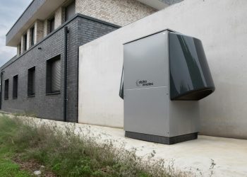 Innovative heat pump system by alpha innotec installed outside a contemporary building.
