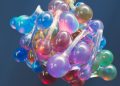 Abstract 3D representation of a colorful molecular structure, showcasing vibrant hues and artistic design.