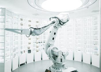 white robotic arm in display showroom