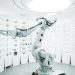white robotic arm in display showroom