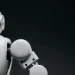 Close-up of a modern, monochrome robot arm against a dark background. Futuristic technology concept.