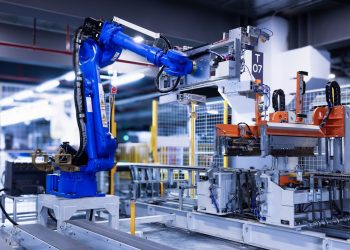 blue industrial robot arm in factory