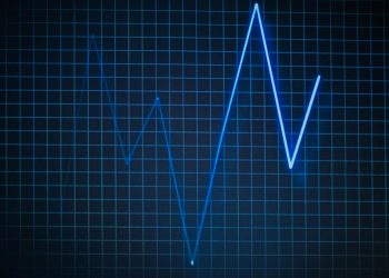ECG graph on a grid background symbolizing heartbeat and medical data.