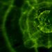 Dynamic abstract pattern featuring green light reflections, creating a vibrant and mysterious atmosphere.