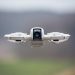 A high-resolution image of a drone flying outdoors, capturing technology's essence and innovation.