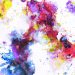 A colorful abstract watercolor painting featuring vibrant splashes of color in a dynamic composition.
