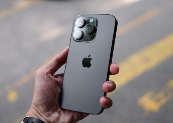 a person holding an iphone in their hand