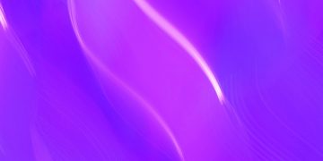 A dynamic abstract image featuring vibrant purple light streaks, creating an energetic and modern feel.
