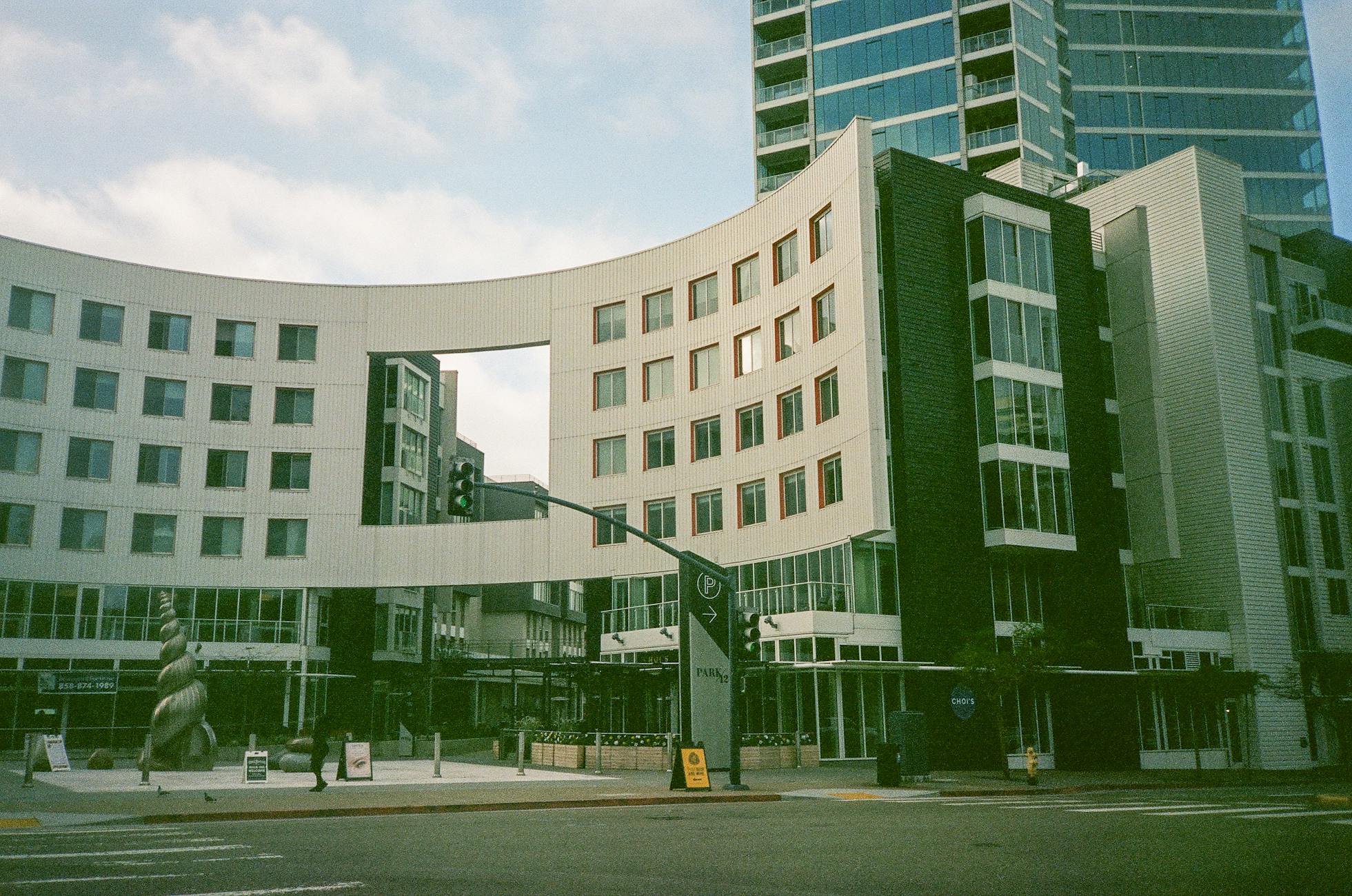 Modern building with unique design captured outdoors on a clear day.