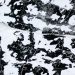 Abstract aerial view of cracked patterns on a frozen lake in Minnesota.