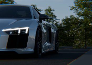 Dynamic shot of a sleek supercar driving on a scenic road in Hamburg, Germany, showcasing modern automotive design.
