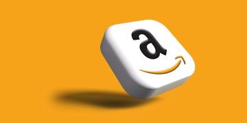 a close up of a dice with an amazon logo on it
