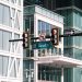 Contemporary intersection with traffic signals at South Street, featuring urban architecture and glass buildings.