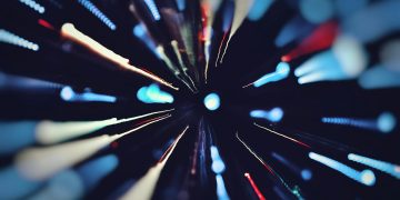 Vibrant abstract light trails captured with long exposure, creating a colorful dynamic effect.