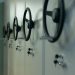 Close-up of industrial safes with manual locks and keys, highlighting security features.