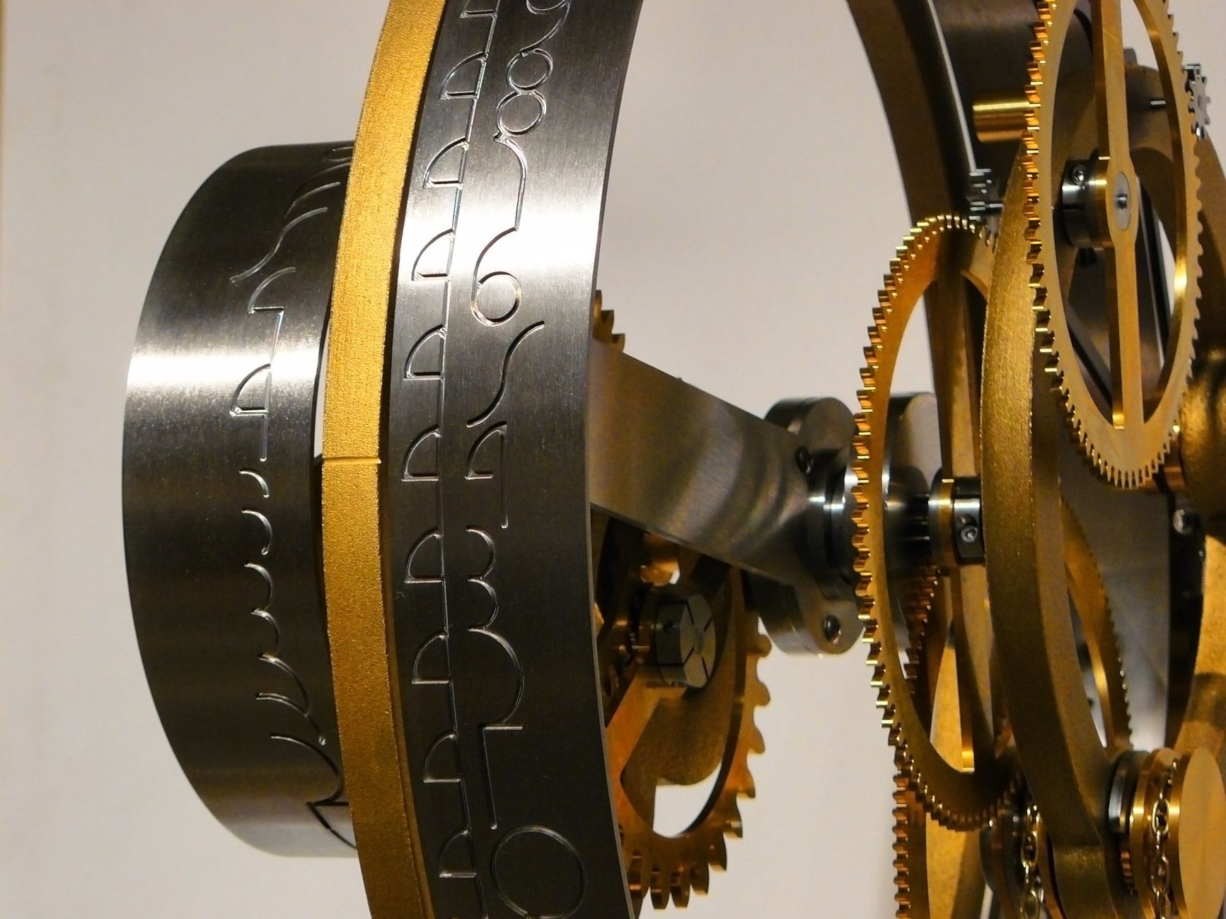 Close-up of a complex gear mechanism showcasing intricate metal patterns and craftsmanship.
