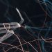 Abstract image showcasing dynamic light trails with motion lines on a dark background.