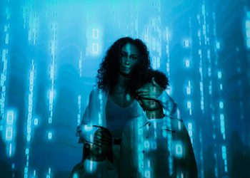 A family stands in digital blue light, symbolizing online privacy and security.